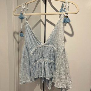 light blue flowy top with tassels